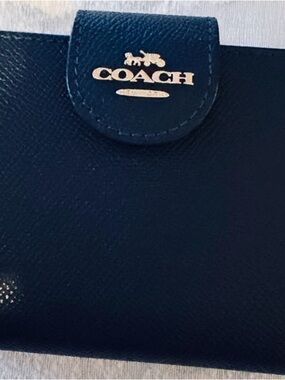 Brand New never used 
COACH Midnight Navy Leather Compact Wallet Gold Logo